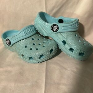 Crocs size 6c. Light blue glittery.